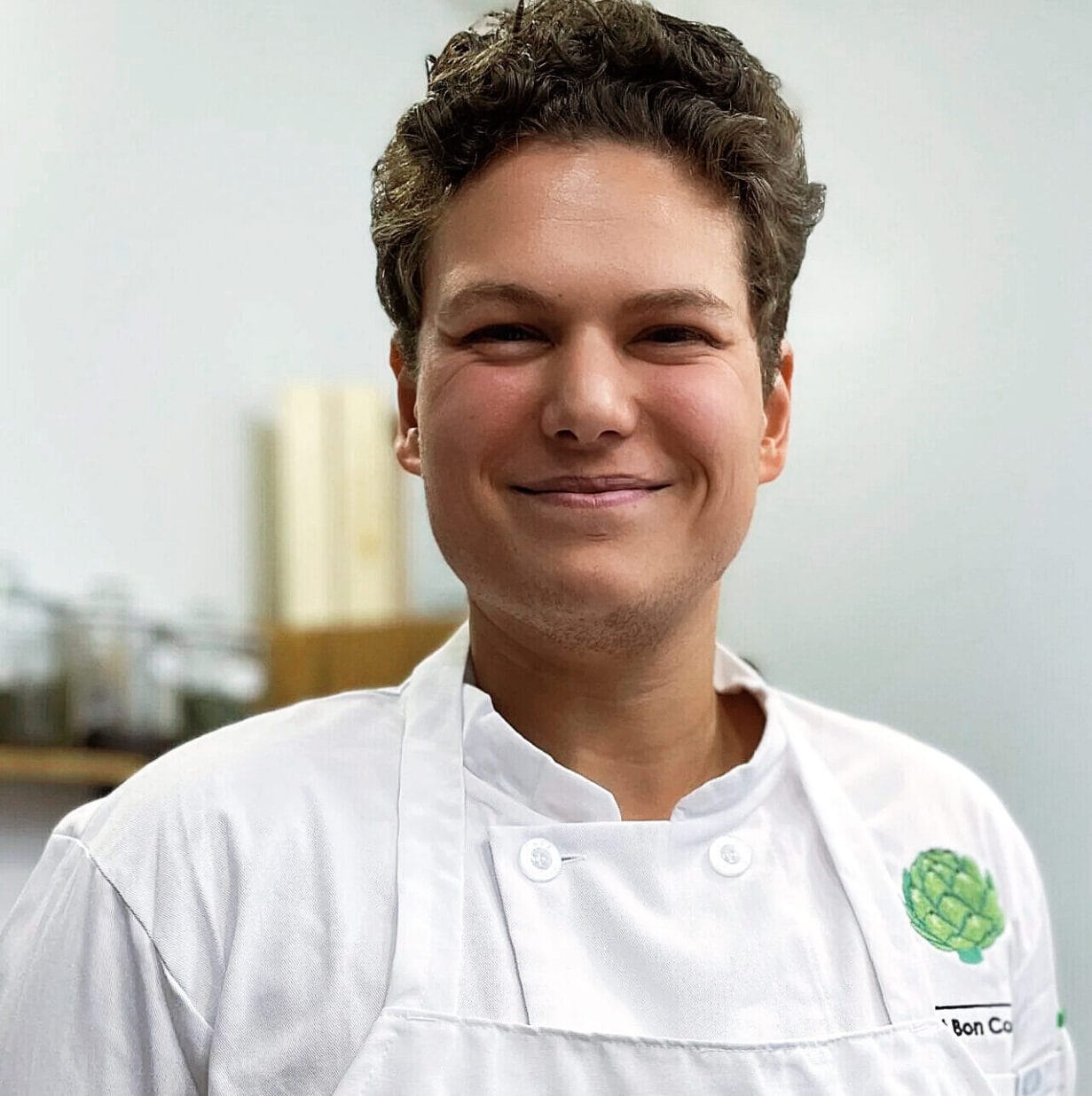 Arnold Kuiper - Instructional Chef at C'est Bon Ottawa posing in his chef's uniform.